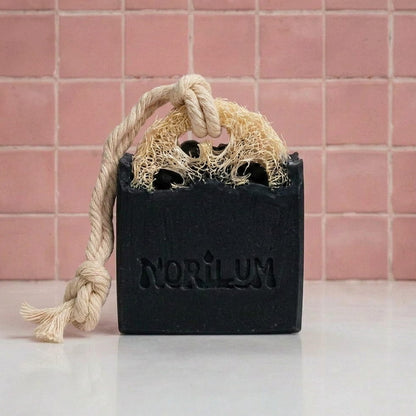Handmade activated charcoal loofah deep detox exfoliating soap bar 
by Norilum New Zealand
