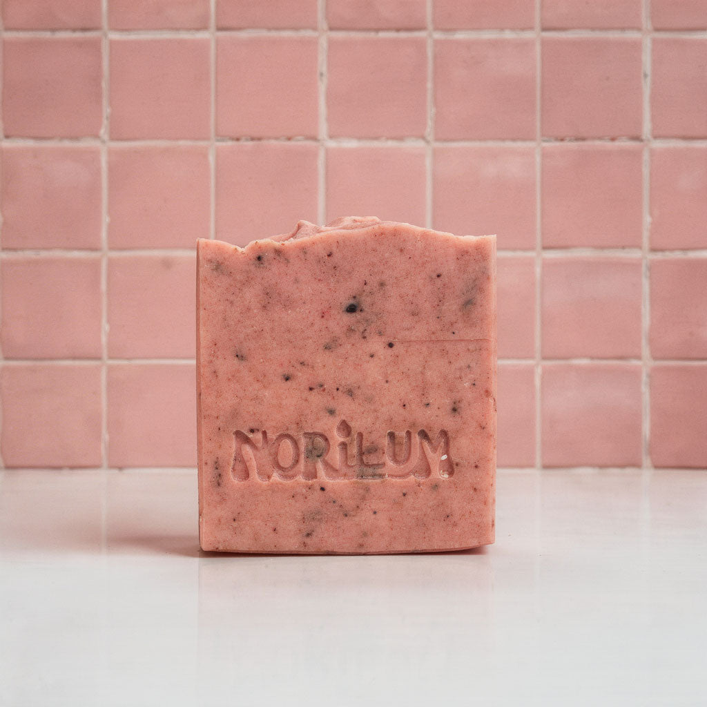 Handmade hibiscus lavender exfoliating soap bar with dried flower 
petals by Norilum New Zealand