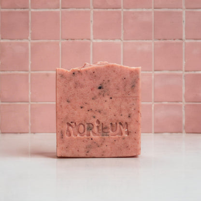 Handmade hibiscus lavender exfoliating soap bar with dried flower 
petals by Norilum New Zealand
